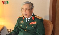 Vice Defense Minister Nguyen Chi Vinh meets Vietnamese chief representatives abroad 