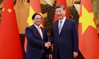 PM Pham Minh Chinh meets Chinese leader Xi Jinping in Russia