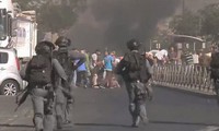 Riots erupt in Jerusalem after the killing of a Palestinian teenager