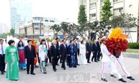 Vietnamese leaders burn incense to President Ho Chi Minh and Ton Duc Thang