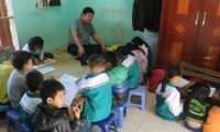 Disabled teacher dedicated to poor children