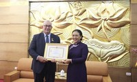 Belgian Ambassador given “For peace and friendship among nations” insignia 