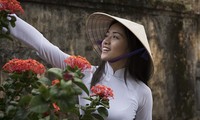 Inconfundible belleza de Ao Dai, vestido tradicional de mujeres vietnamitas 