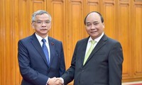 Vietnam y Laos comparten experiencias sobre protección de medio ambiente 