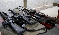 New Zealanders give up guns after massacre