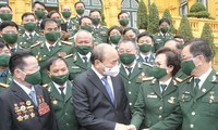 President Nguyen Xuan Phuc meets with outstanding war veteran businesses