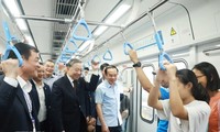 Party chief takes ride on Ben Thanh – Suoi Tien metro line