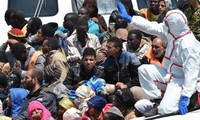 Italy rescues 3,300 boat migrants in one day