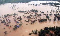 สถานประกอบการเวียดนามให้การช่วยเหลือประชาชนลาวในเขตที่ได้รับความเสียหายจากเหตุเขื่อนแตก