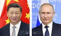ผู้นำจีนและรัสเซียพูดคุยผ่านทางโทรศัพท์