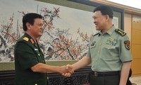 Vietnam, China boost defense cooperation