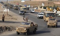 Iraqi Kurdish forces fight Islamic State in Syria