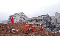 China landslide: Rescuers search for 91 people still missing