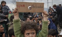 Greece vows to defuse migrant camp in a week