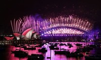 2020 slinks into history as fireworks light deserted streets