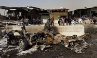  Series of bombings kill or wound more than 100 in Iraq