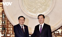 Vuong Dinh Huê rencontre Wang Ning