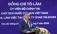 Au Laos, Tô Lâm visite Star Telecom