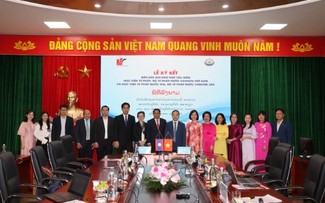 Kerja Sama Erat antara Akademi Kehakiman Vietnam dan Akademi Kehakiman Nasional Laos