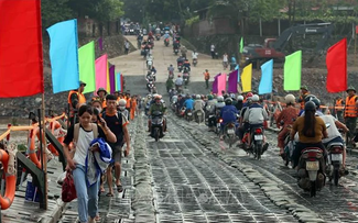 Pontoon bridge opened to traffic after Typhoon Yagi