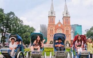 Exploring Ho Chi Minh city by cyclo