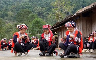 Embroidered ceremonial costumes of the Red Dao people