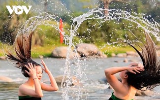 Unique hair washing ritual of white Thai ethnic group