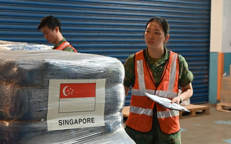 Singapore government’s aid arrives at Noi Bai airport 