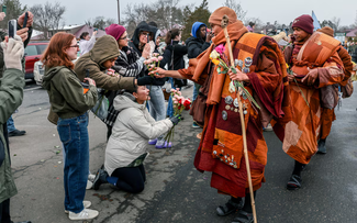 Barefoot monks reach US capital after three-month journey for peace