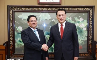 Premier vietnamita se reúne con alto dirigente de Chongqing (China)