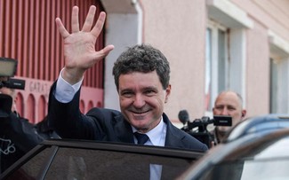 Élections en Roumanie et Pologne: les pro-européens en tête