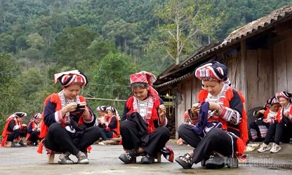 Embroidered ceremonial costumes of the Red Dao people