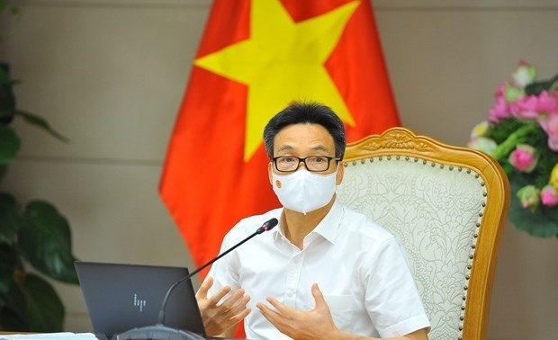  Le vice-Premier ministre Vu Duc Dam travaille avec le Comité du Parti de Hô Chi Minh-ville