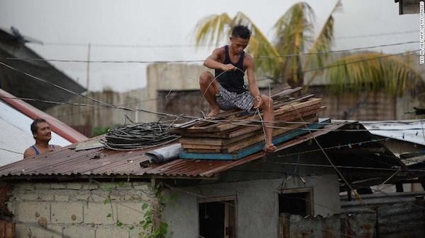 Massive storms devastate US, Philippines