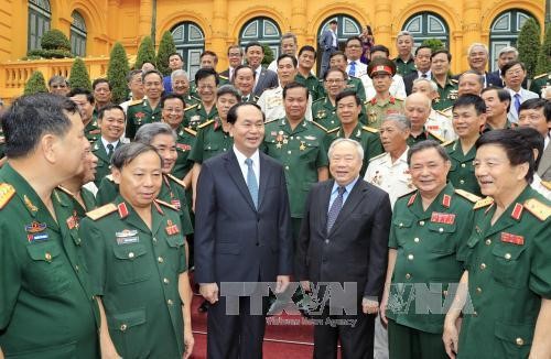 President meets former volunteer soldiers in Cambodia 