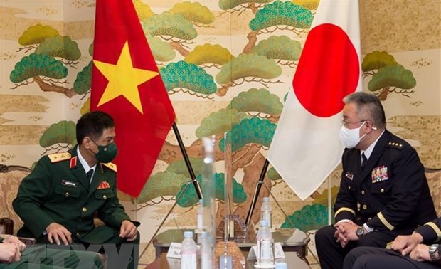 越日の地上軍の間の交流協力を促進