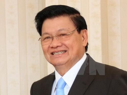 PM Laos yang datang ke Viet Nam bersama-sama memimpin persidangan ke-41 Komite Antar-Pemerintah Viet Nam-Laos