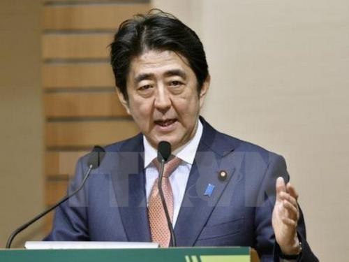 Japan vows to find new avenues for economic growth and ratify TPP trade deal 