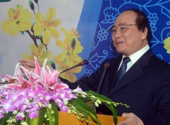 Deputy PM Vietnam nguyen Xuan Phuc mengucapkan hari raya Tet kepada Grup perlistrikan Vietnam