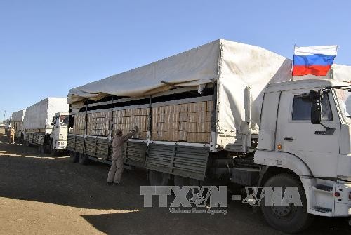 Russia and the EU provide humanitarian aids to eastern Ukraine