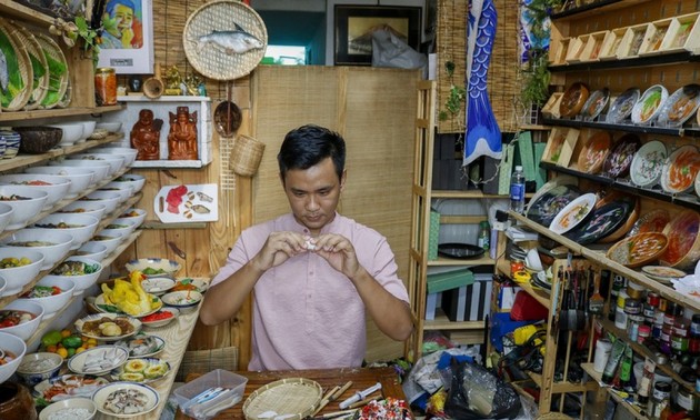 Unique Tet trays showcase national delicacies made from clay