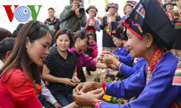 Thread bracelet tying custom of ethnic people in Vietnam’s northern mountains 