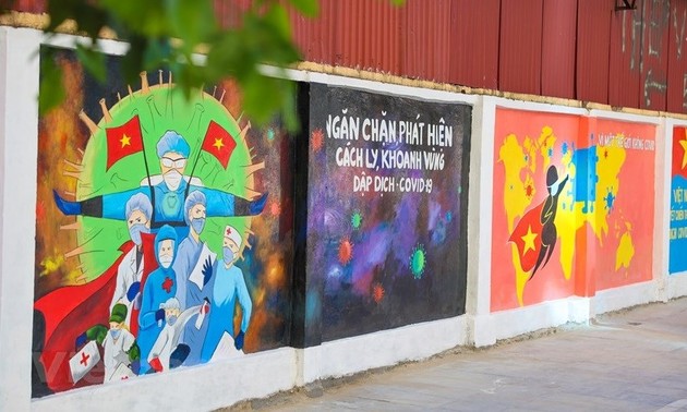 Murals in Hanoi convey message of fighting Covid-19