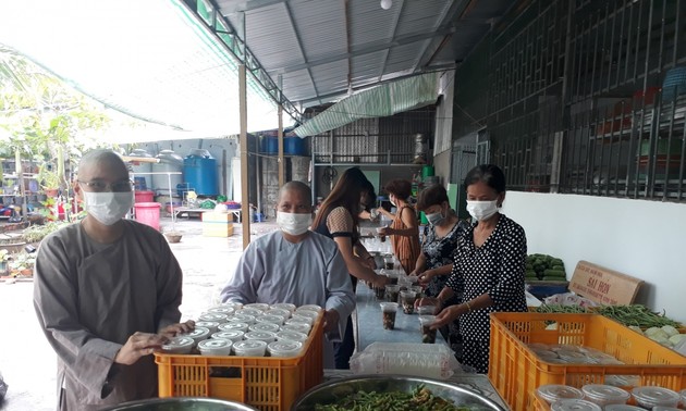 Wholehearted Buddhist nun in charity work