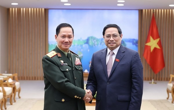 Vietnam, Laos promote cooperation in national defence