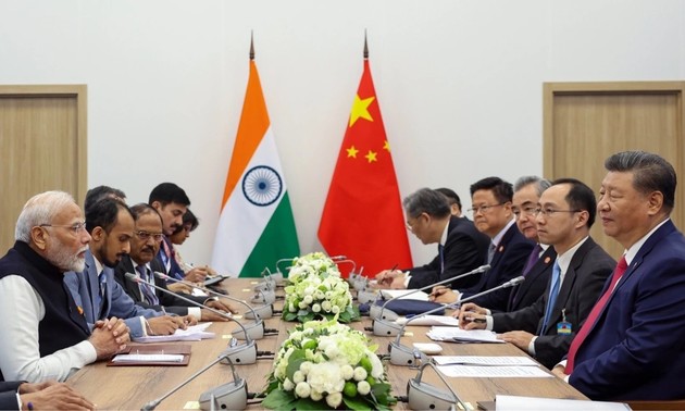 Indian and Chinese leaders agree to boost bilateral ties 