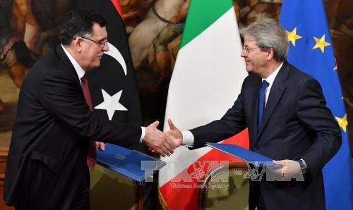 Firman Italia y Libia acuerdo migratorio