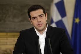 Greek Prime Minister warns of difficulties after extending its bailout 