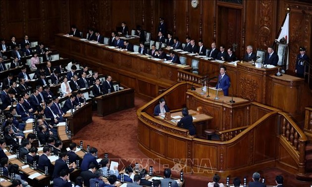 Japan’s Lower House approves record-high budget draft 