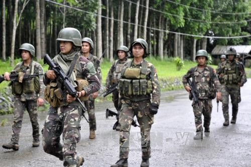 Le président philippin appelle les rebelles à dialoguer